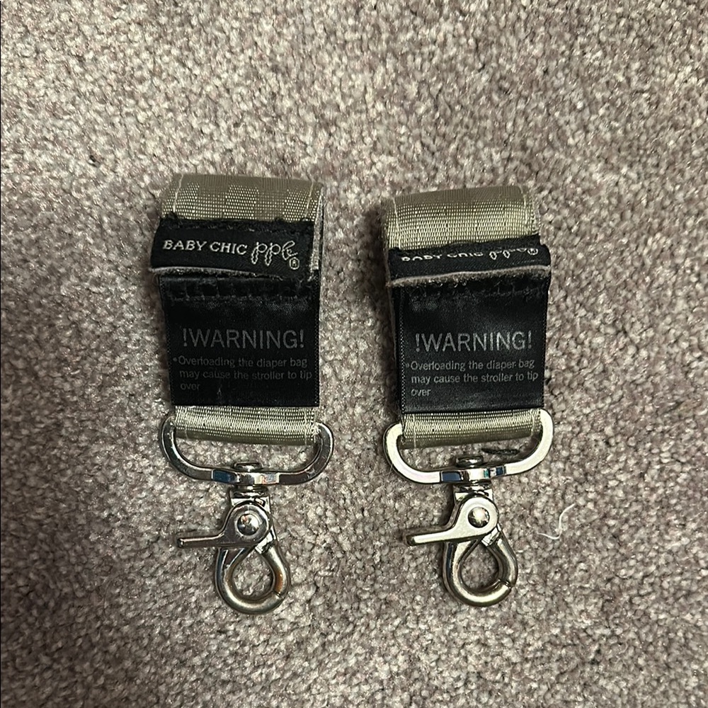 Petunia Pickle Bottom stroller clips in olive green and silver